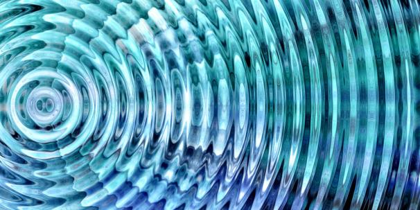 Abstract blue and turquoise concentric ripples radiate outward like sound waves, creating a hypnotic watery tunnel effect with shimmering highlights