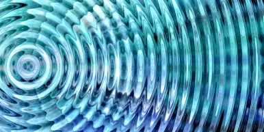 Abstract blue and turquoise concentric ripples radiate outward like sound waves, creating a hypnotic watery tunnel effect with shimmering highlights